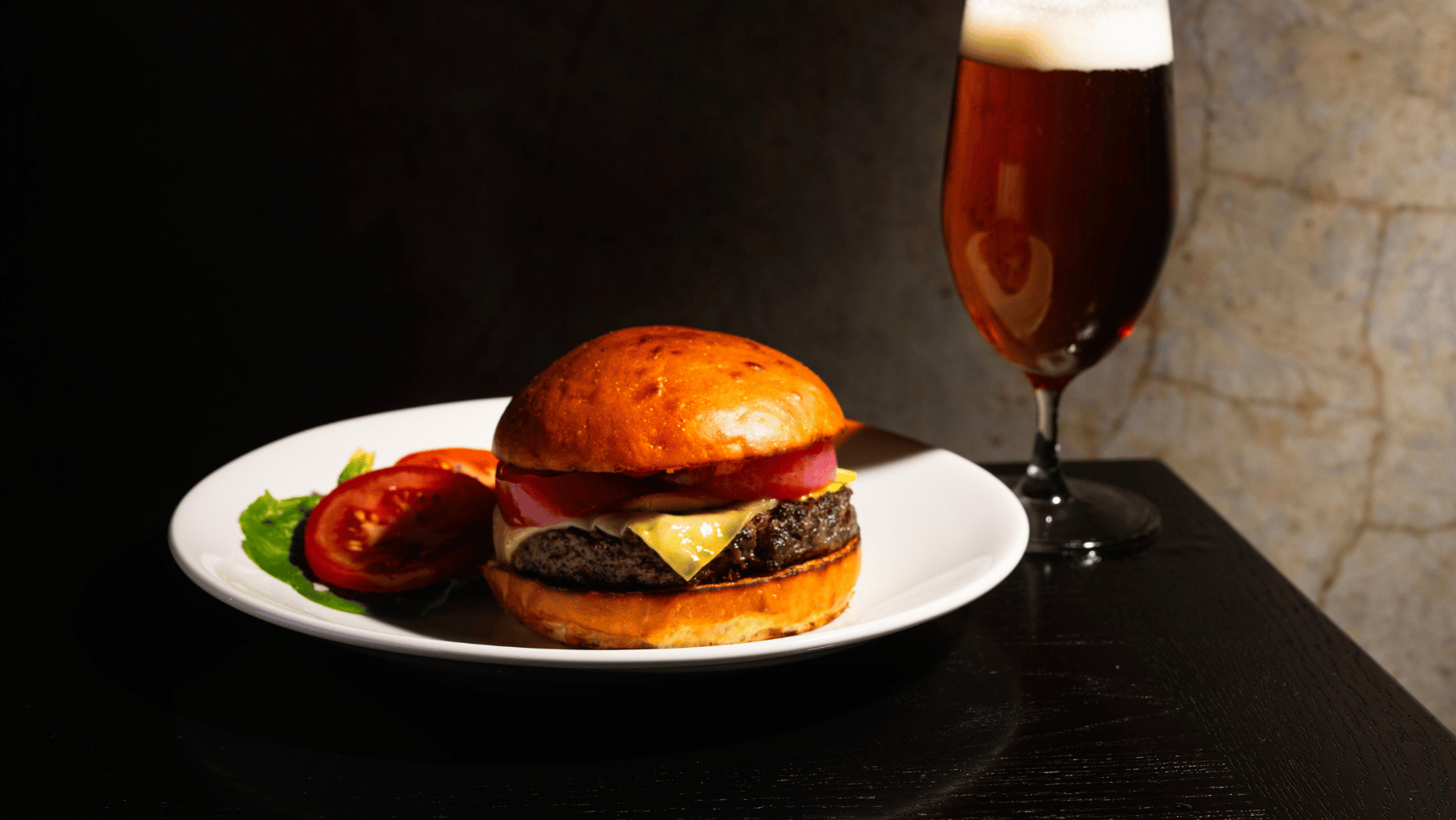 Rockpool Bar & Grill cheeseburger and beer