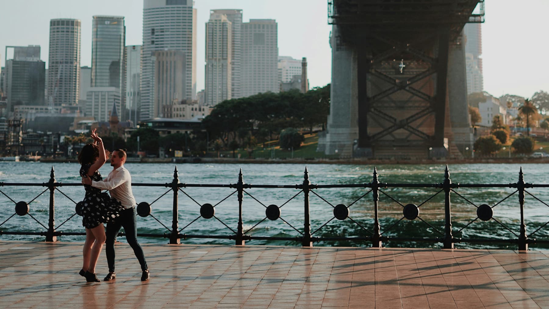 Couple dancing under Sydney Harbour Bridge by Chris Fuller